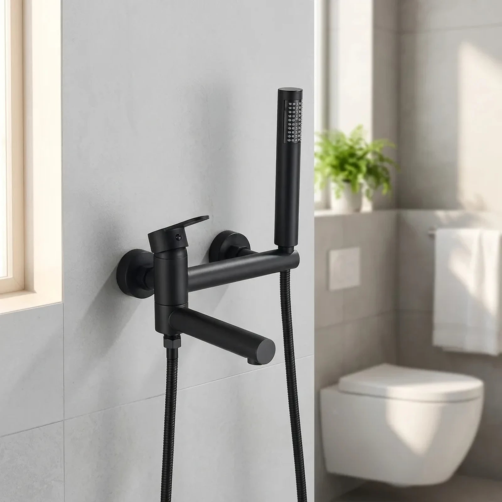 Ducha higiênica Royal Concept preta instalada em parede de porcelanato cinza em banheiro contemporâneo