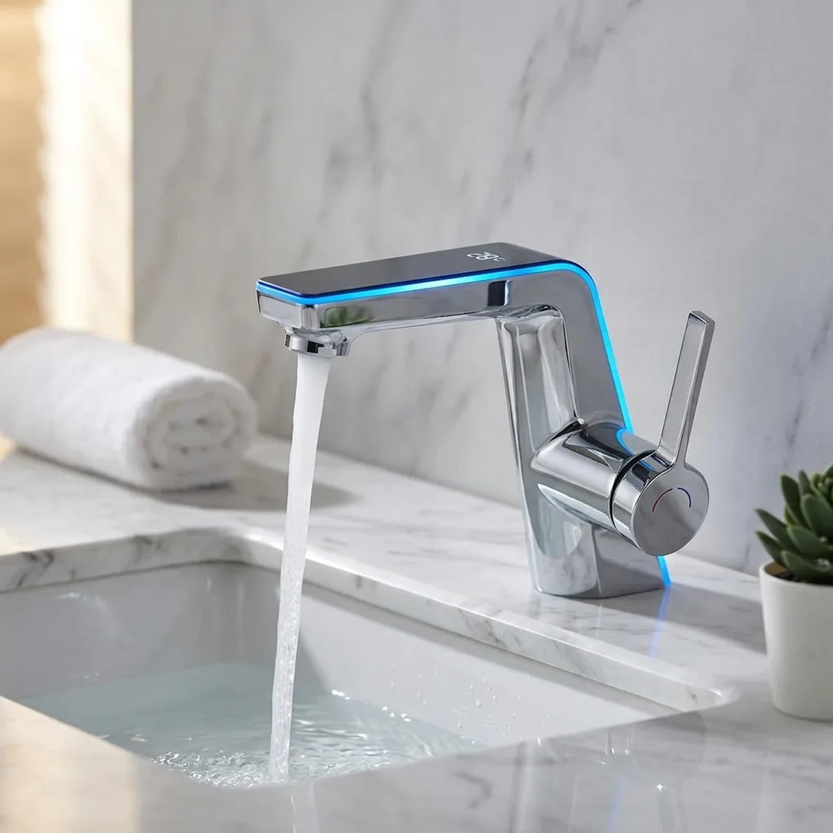 Torneira EliteFlow cromada com display digital instalada em bancada de mármore branco com cuba de embutir
