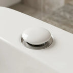 Valvula click para pia de banheiro com acabamento em ceramica branca e aro de aco inox instalada em cuba branca